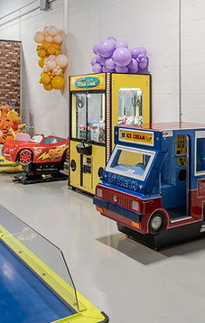 Arcade games and play area inside kids indoor playground Mississauga